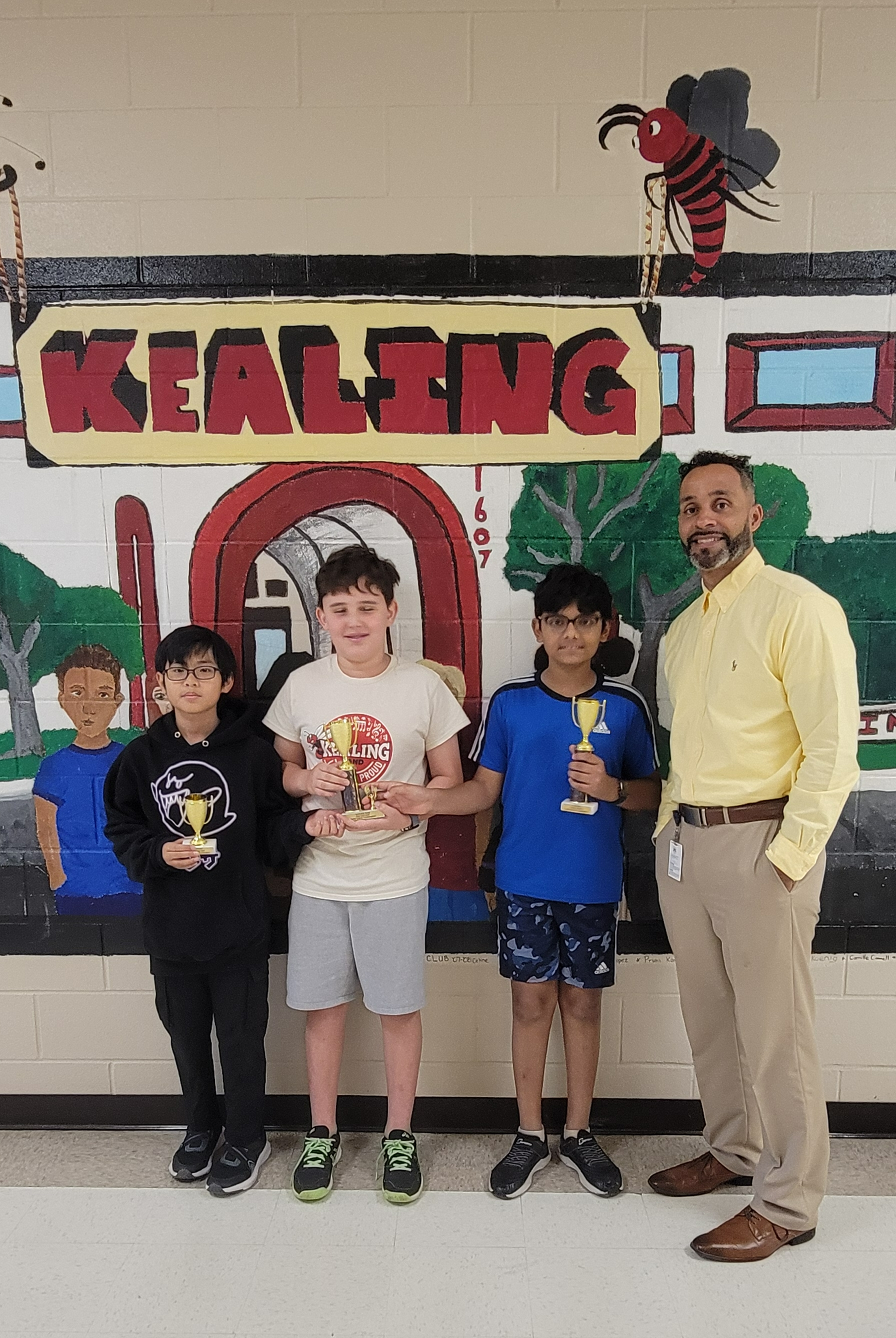 Mr. Estes with Chess Club winners