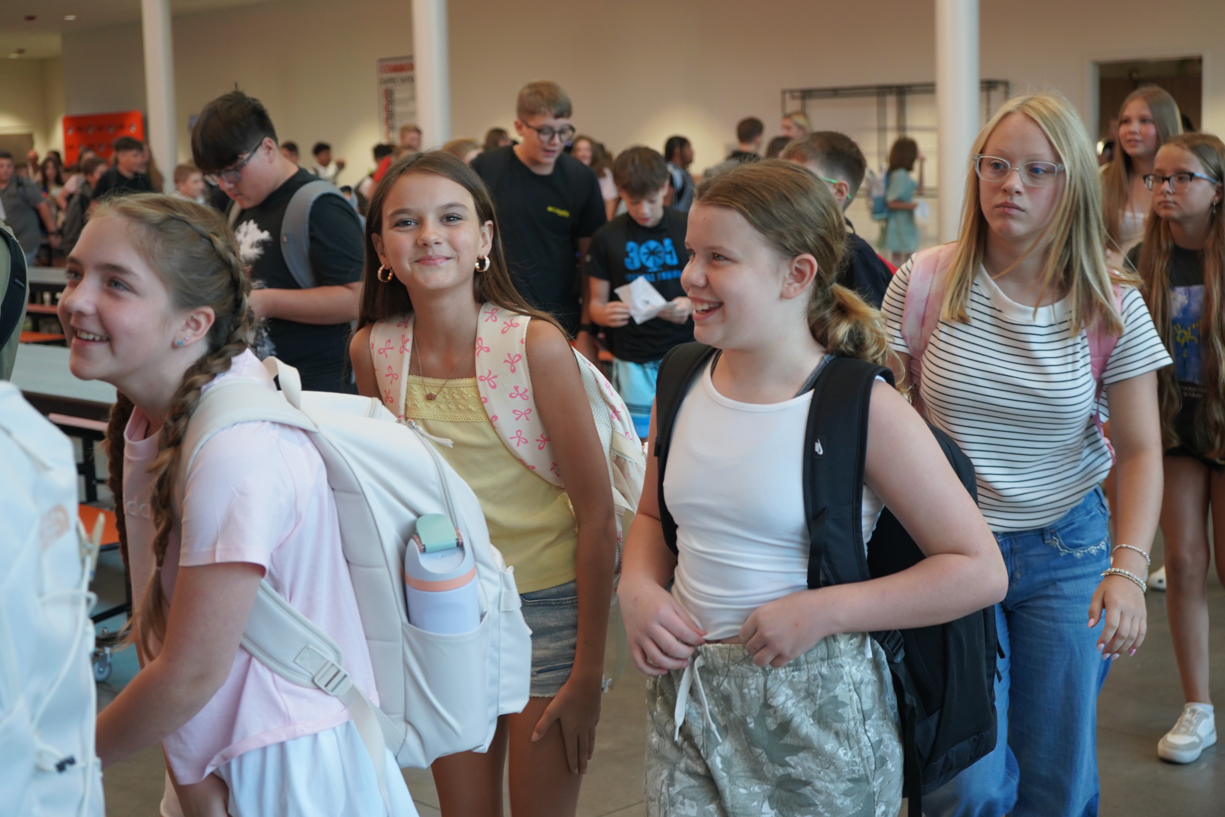 Students walking through the building