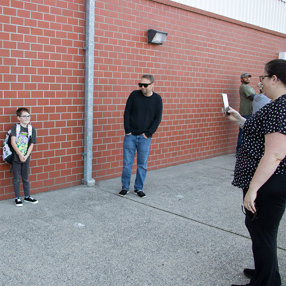 Parent takes a first day of school picture