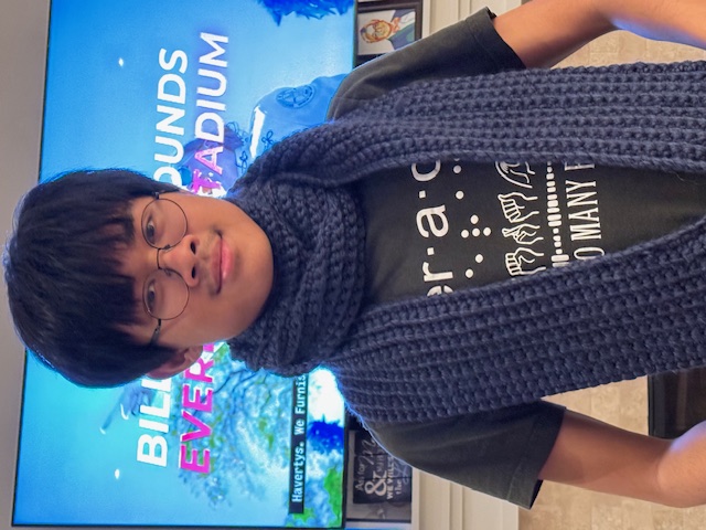 Gabe wearing a navy scarf