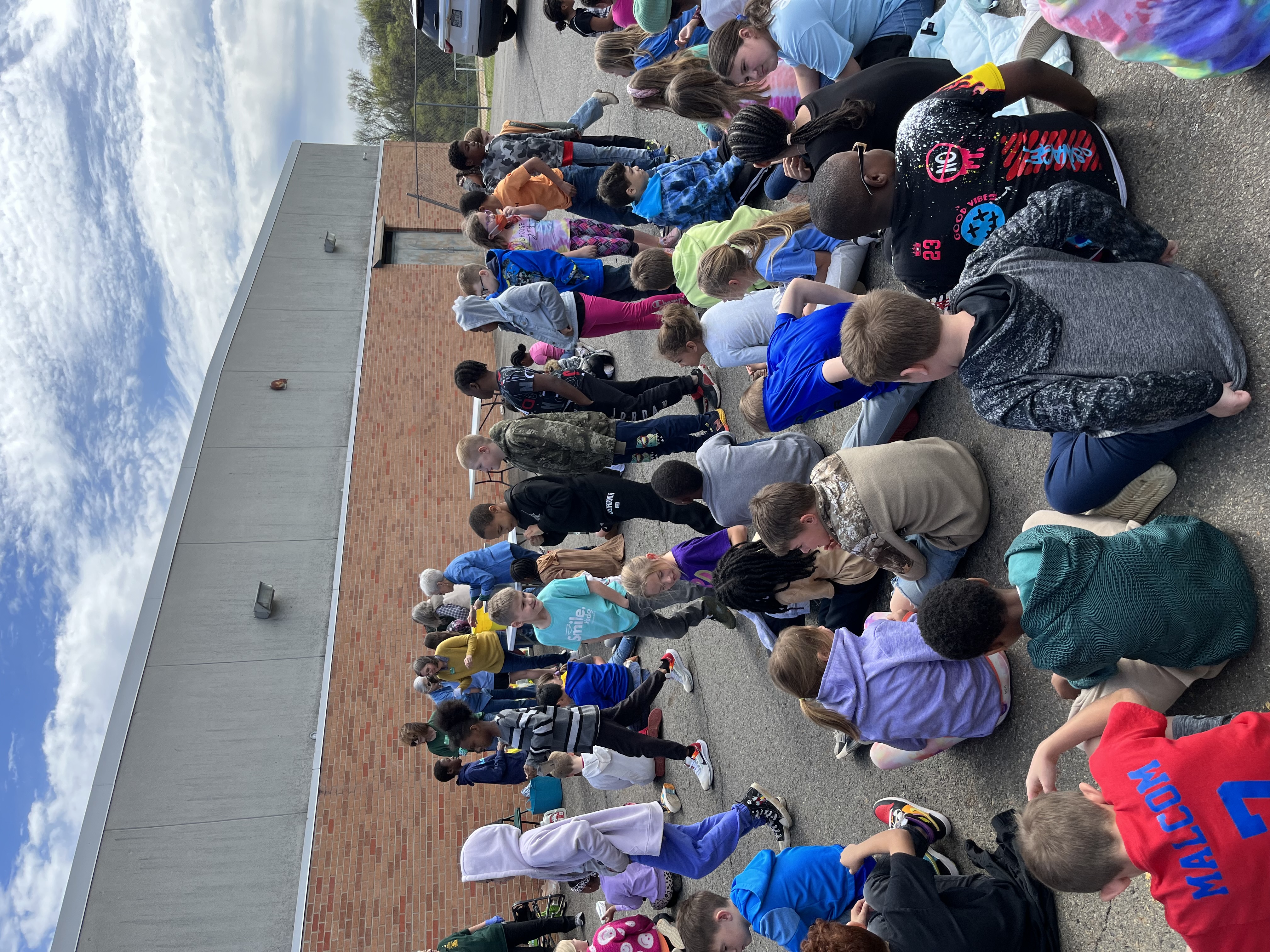 Students waiting their turn to plant