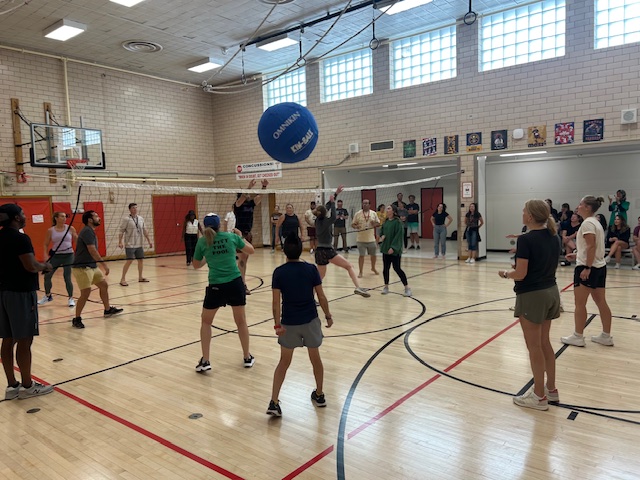 Merrill Staff playing volleyball