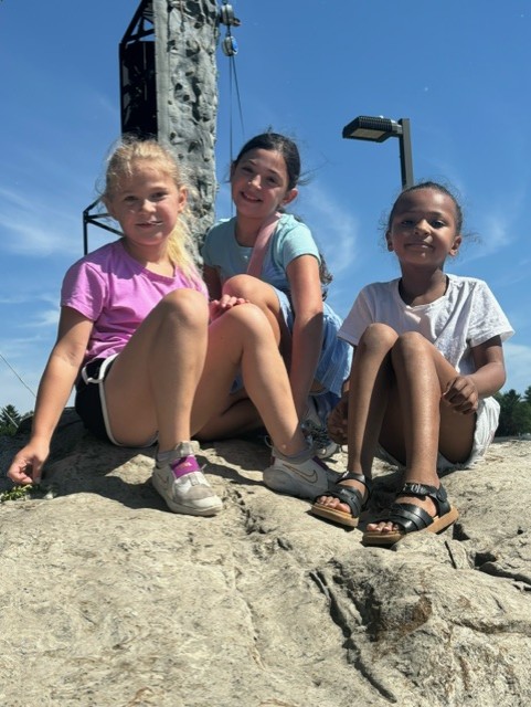 Students by rock wall