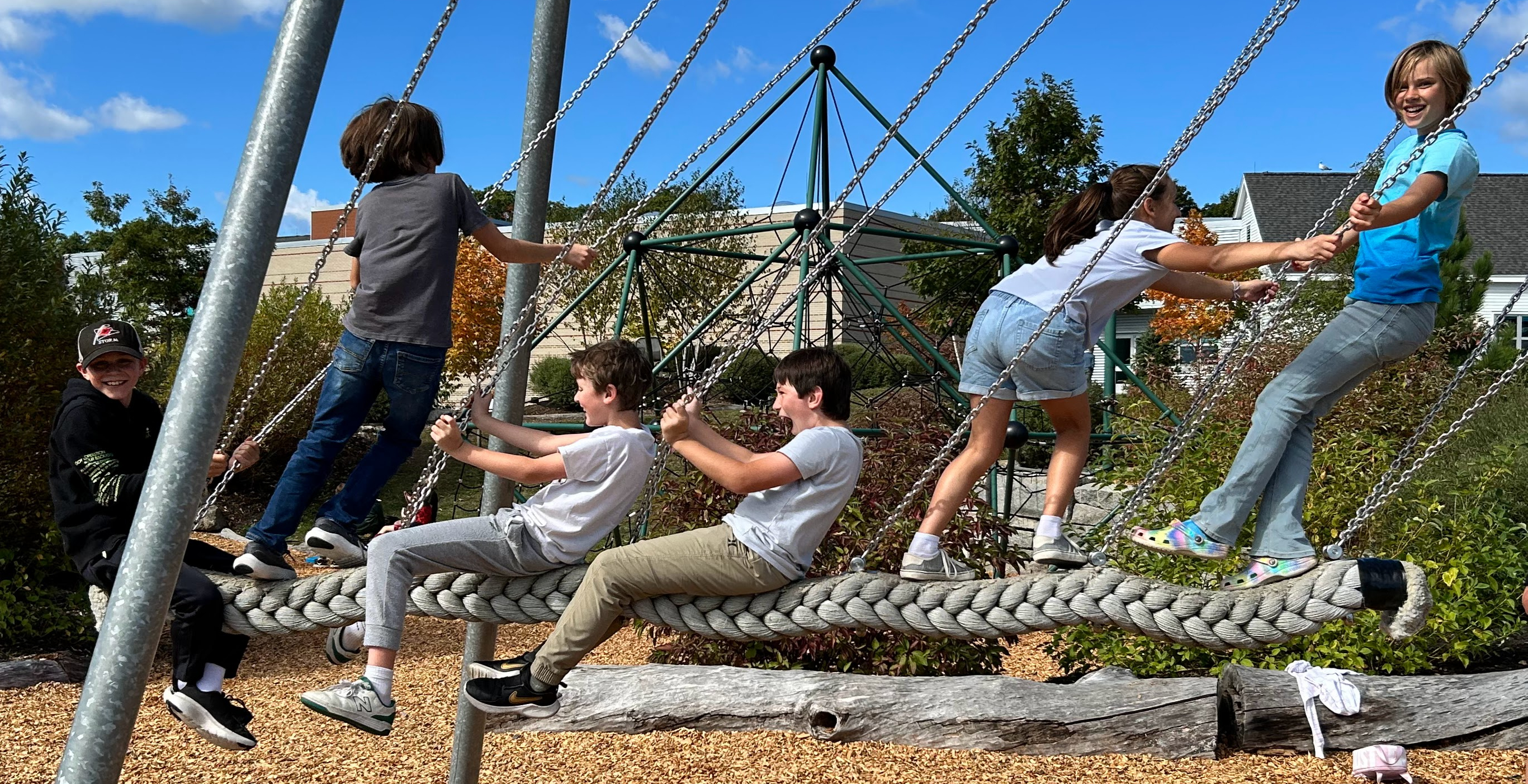 students on playground equipment