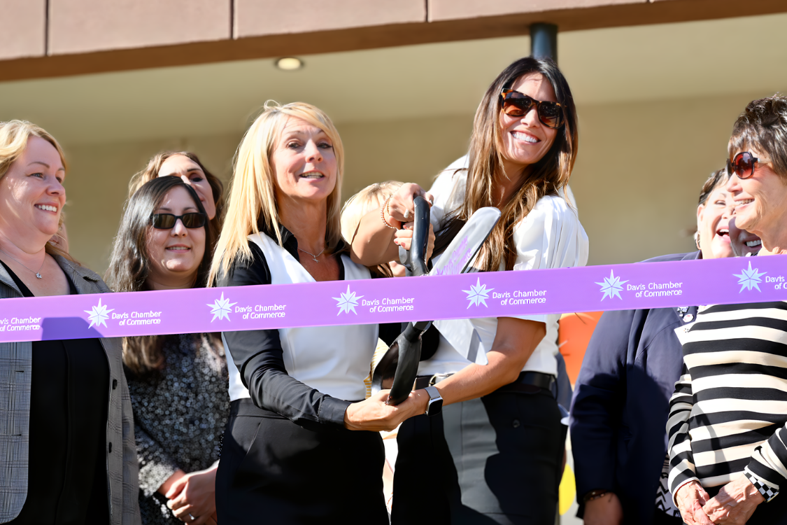 Jodi Lunt at ribbon cutting ceremony with guests