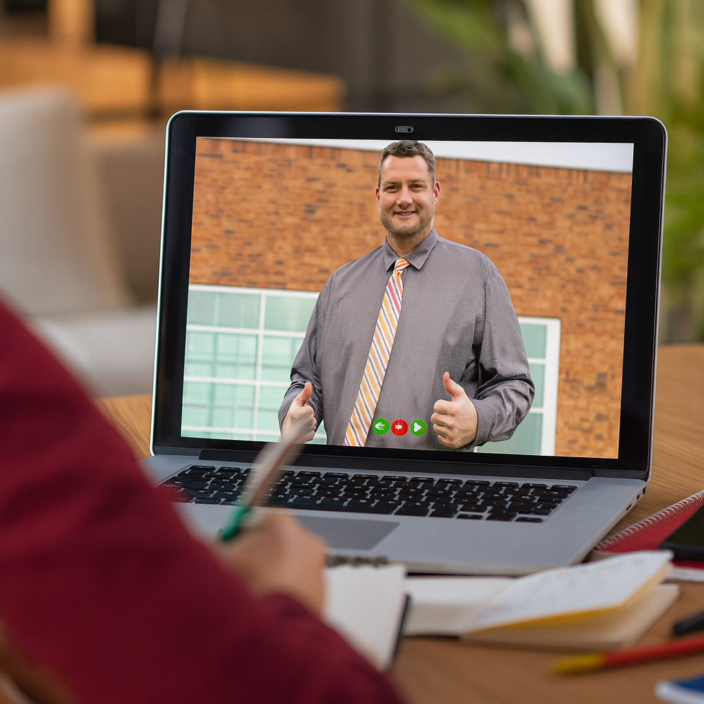 Picture of Principal Zick on the computer