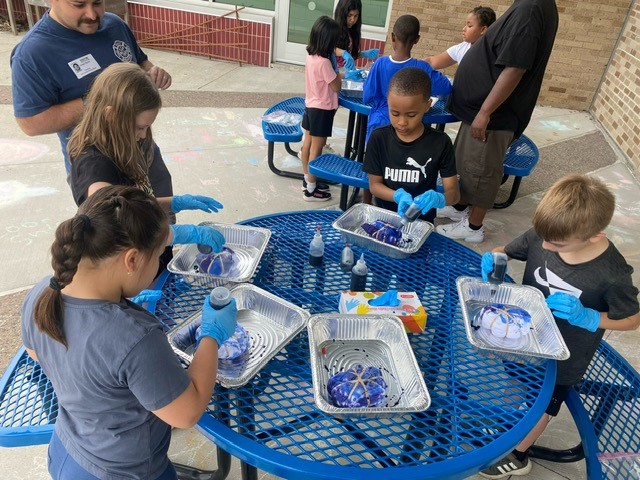 Mrs. Suppa's class tie dying.