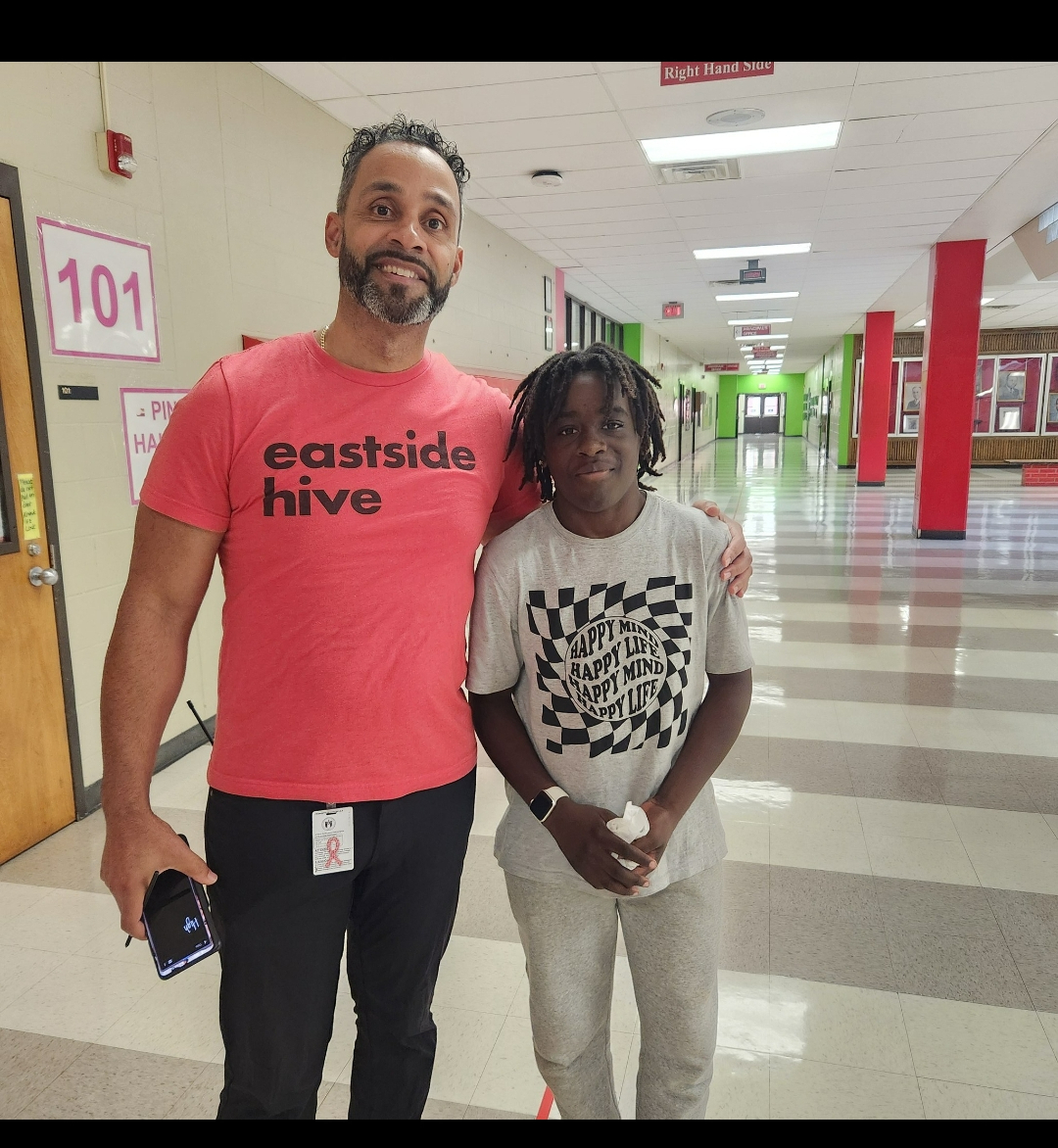 Principal Estes with a student