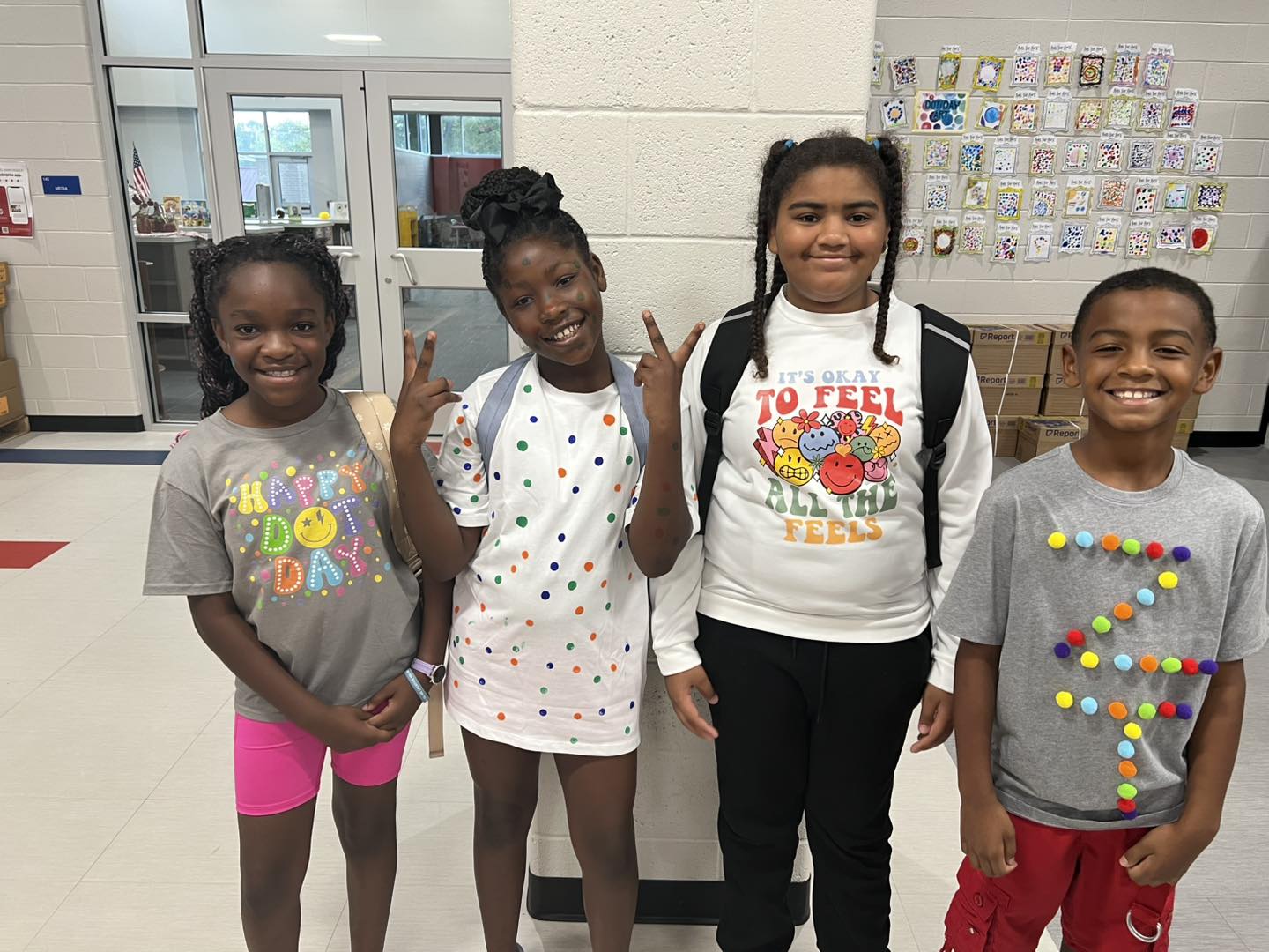 student giving a hi five