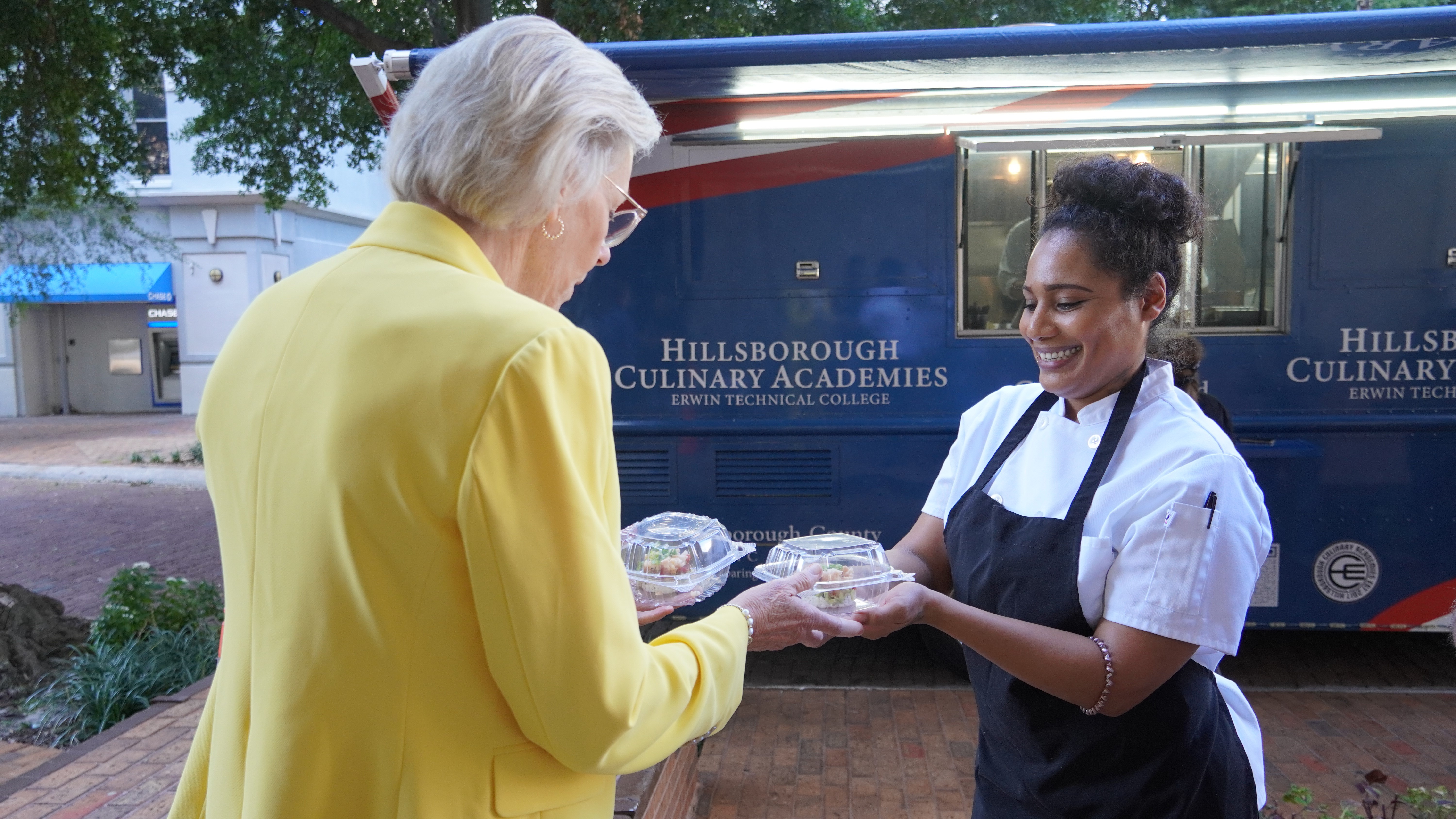Mayor Castor enjoys food from our Culinary Academies