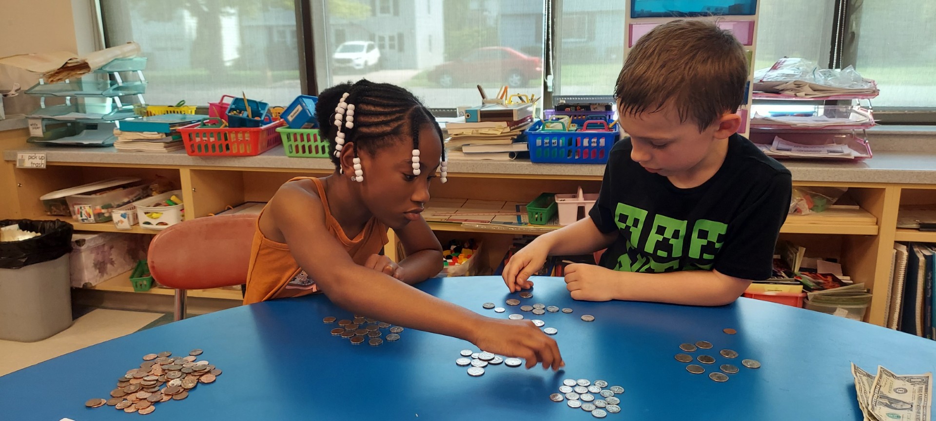 Students counting coins