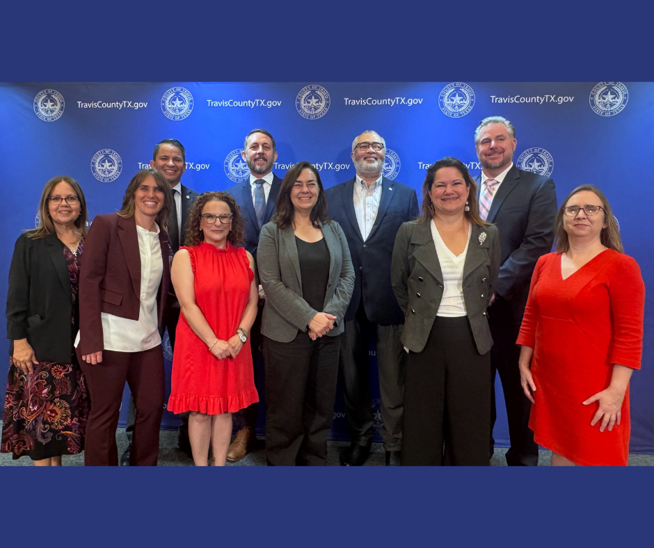 photo of people lined up posing for a picture