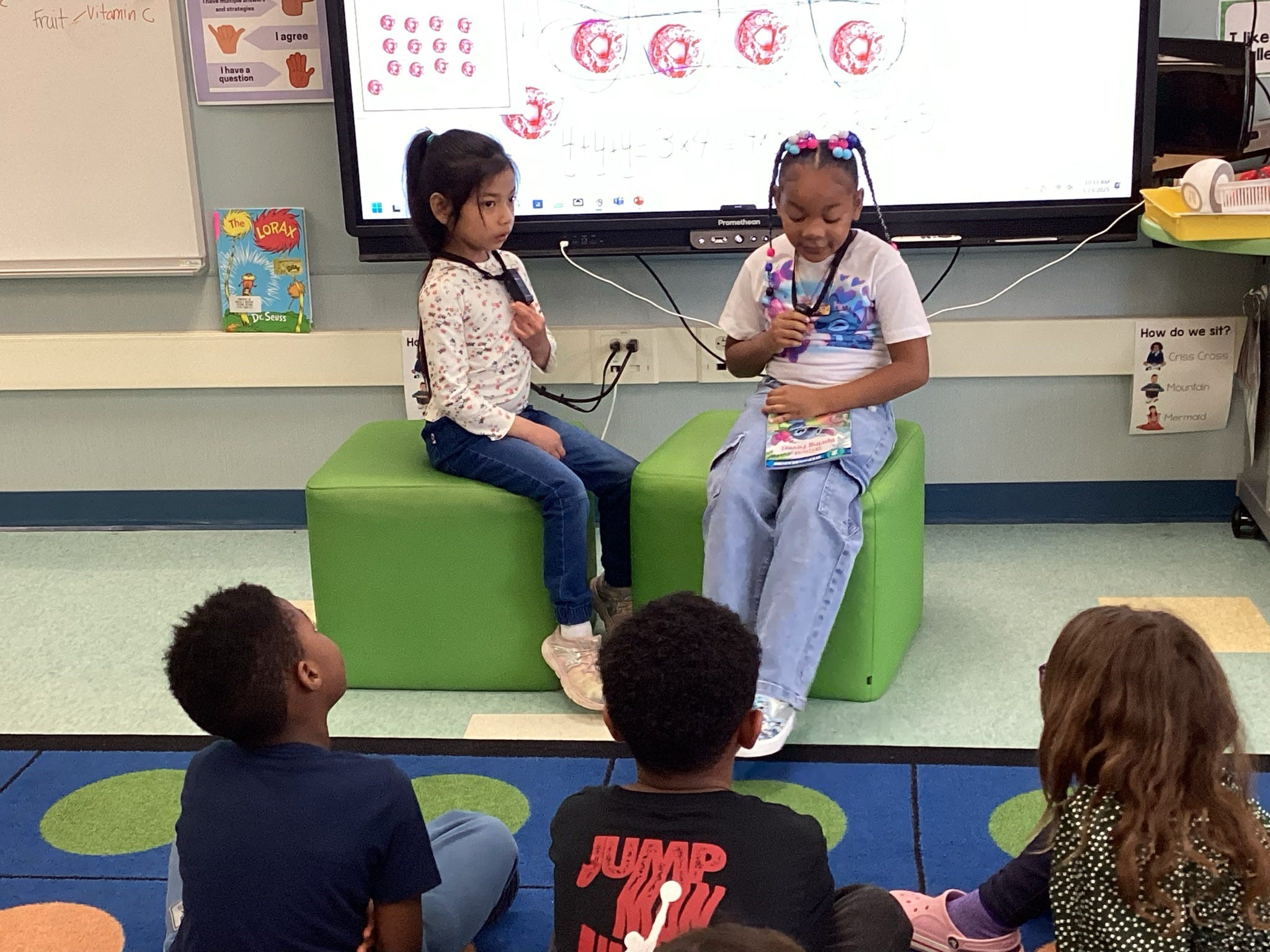 second graders sharing with their class.