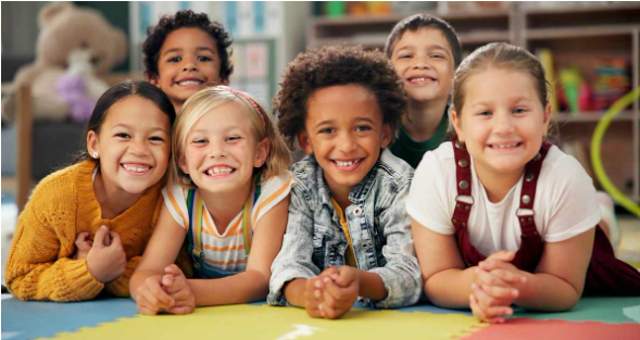 a group of diverse children smiling