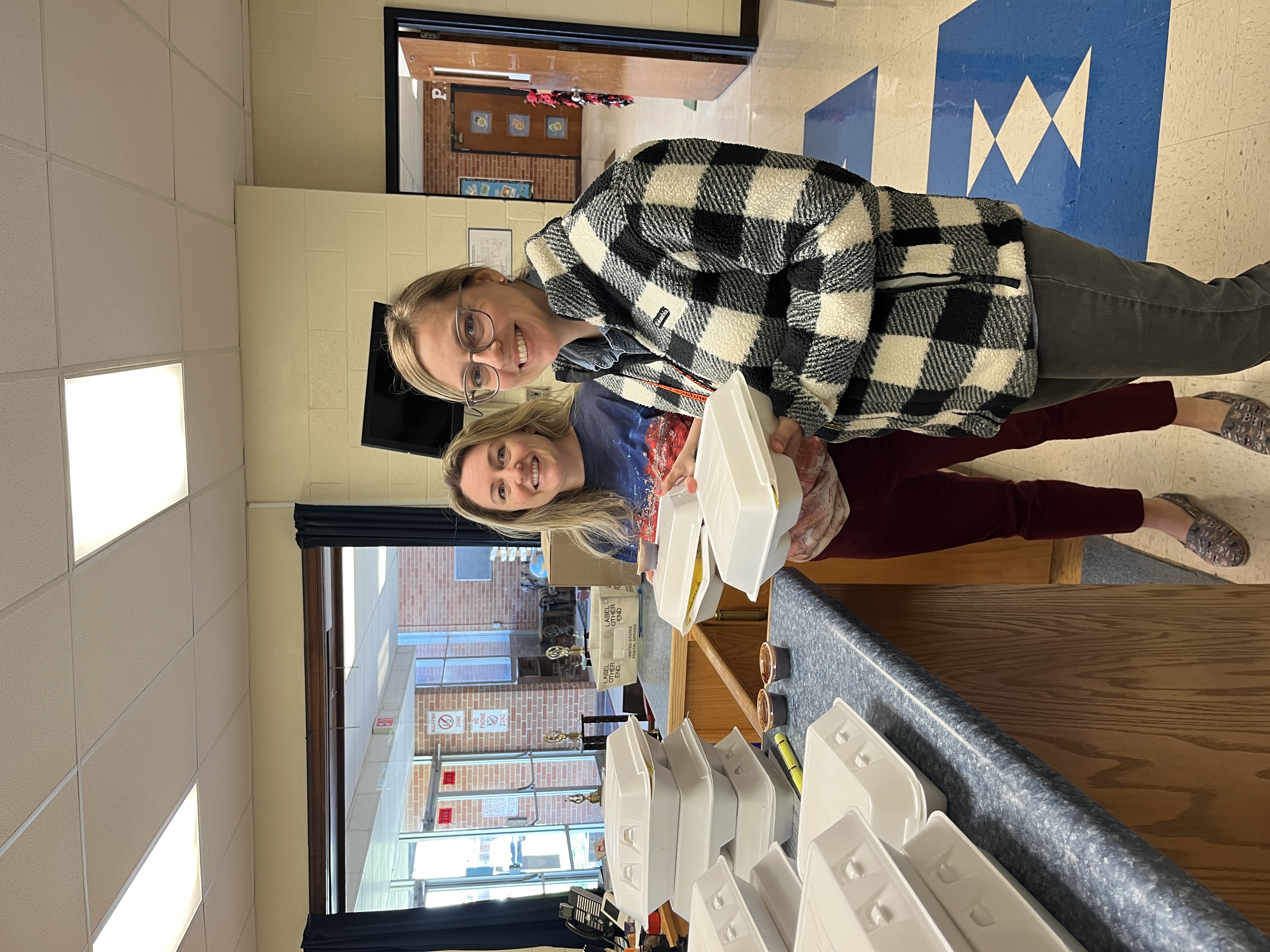 teachers holding lunch