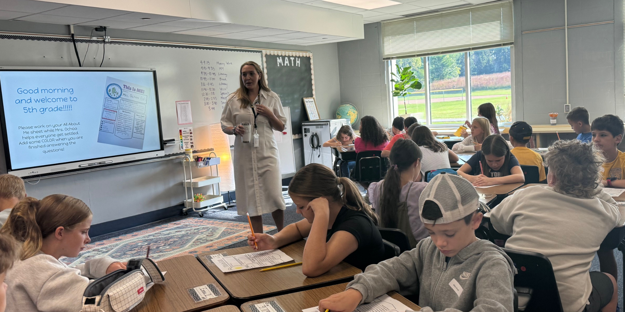 Teacher with students
