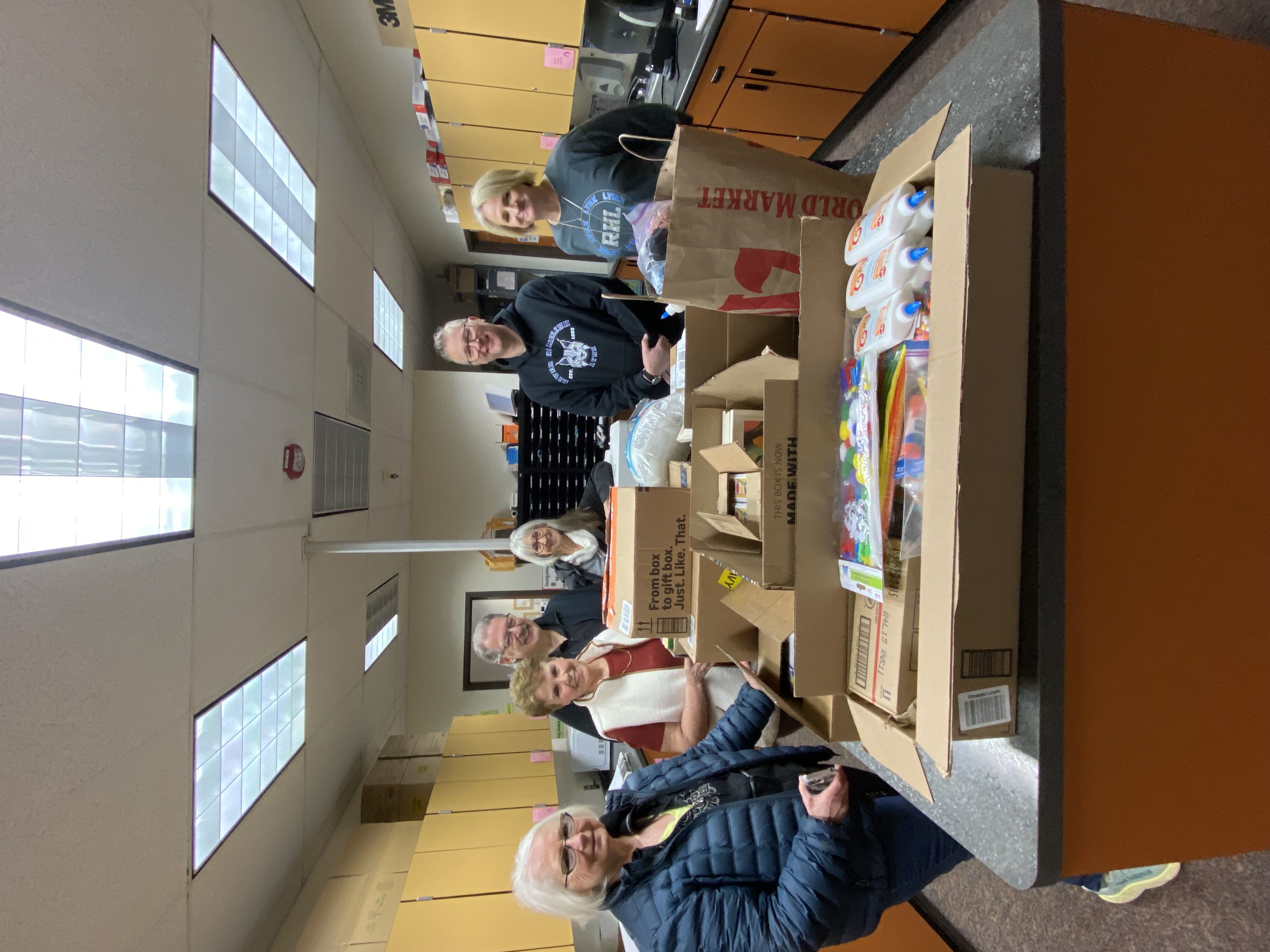 Art Alliance members pose with their donated supplies