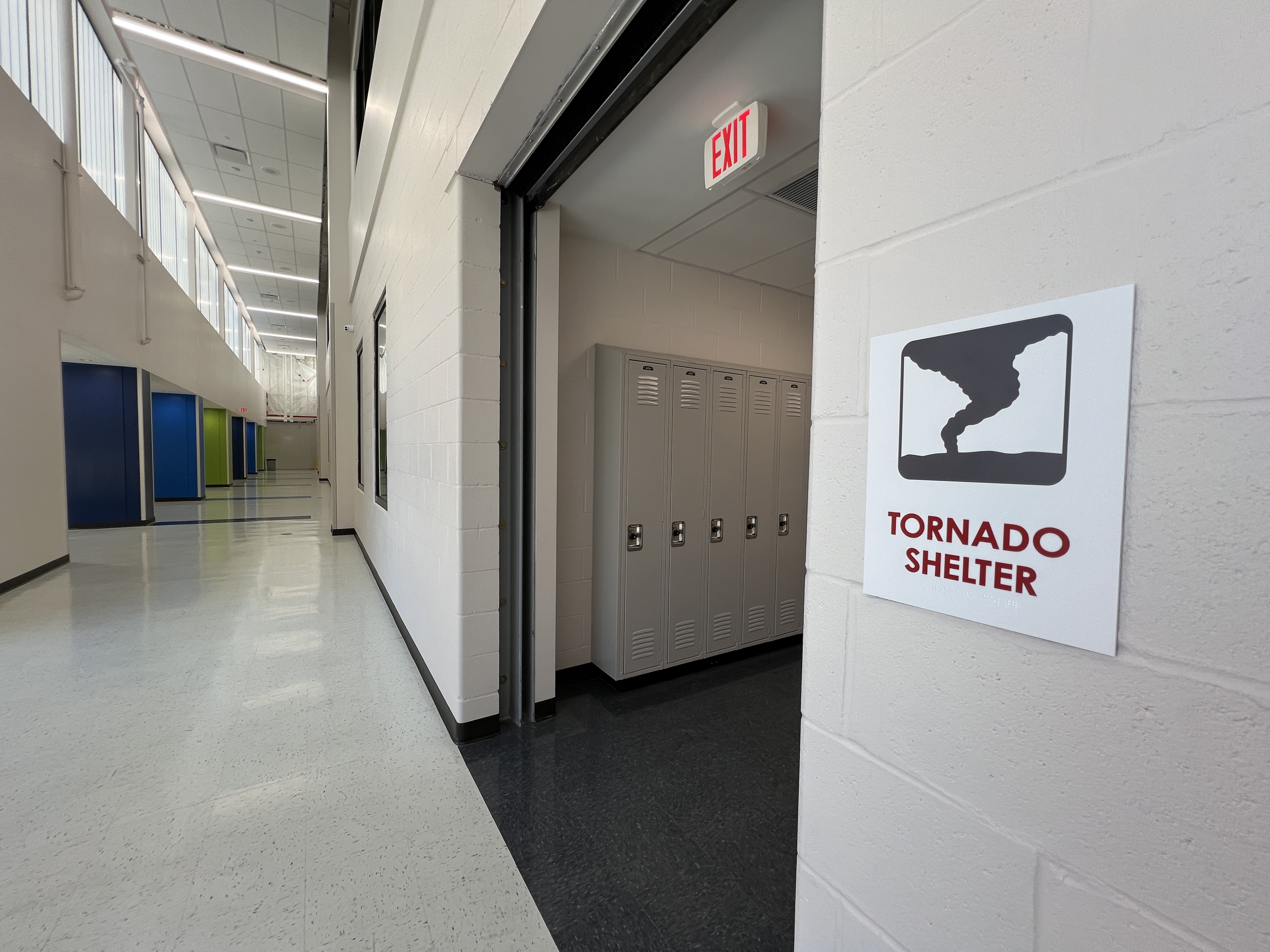 North Middle addition, storm shelter doors roll down at end of hallway, creating safe space in inclement weather