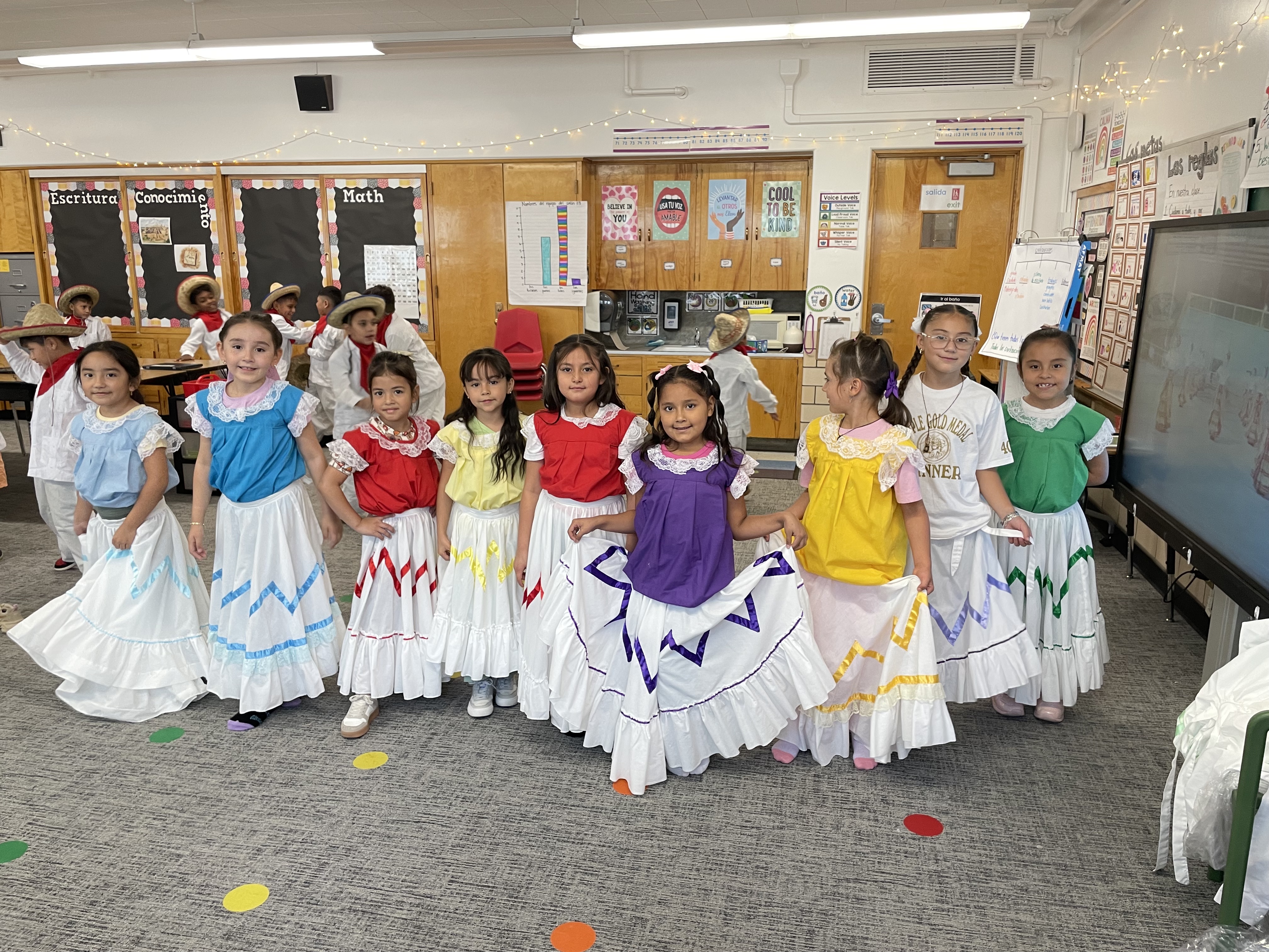 Students smile and pose for a photo as they celebrate Hispanic Heritage Month. 