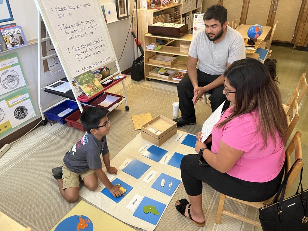 Student presents to his parents