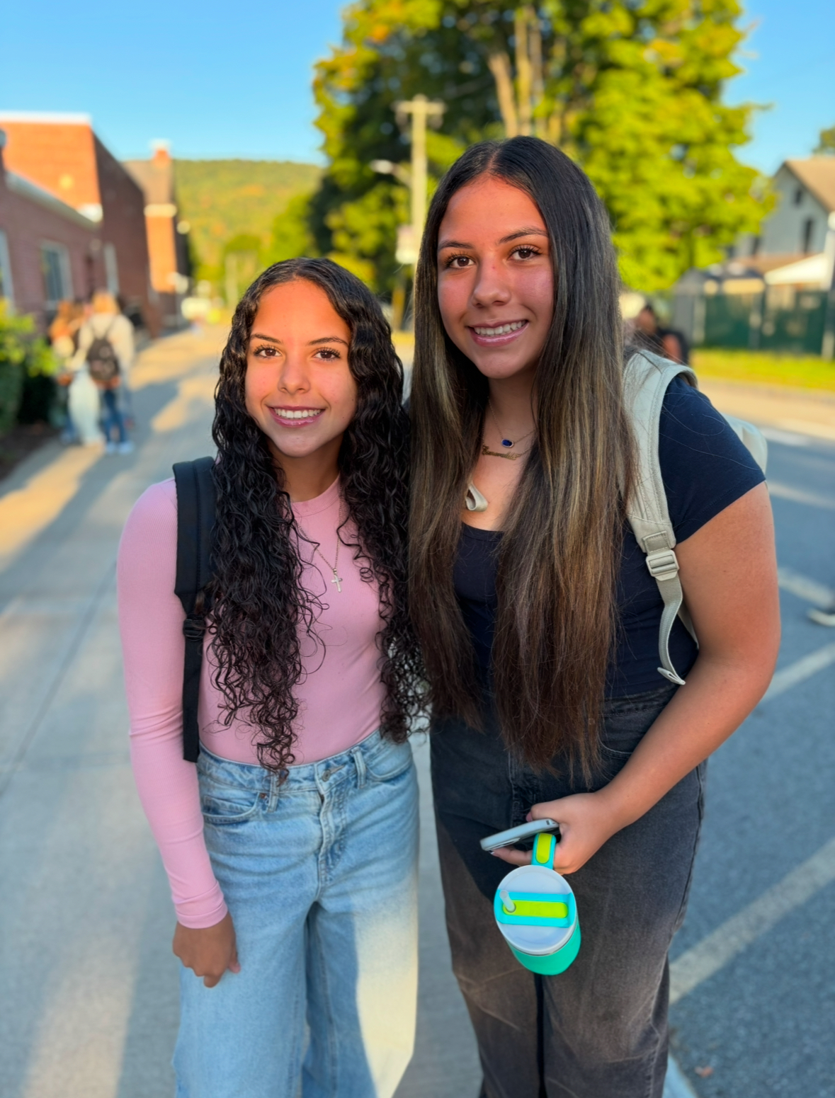 Two Jr/Sr High Girls on the first day of school in the Jr/Sr High Courtyard