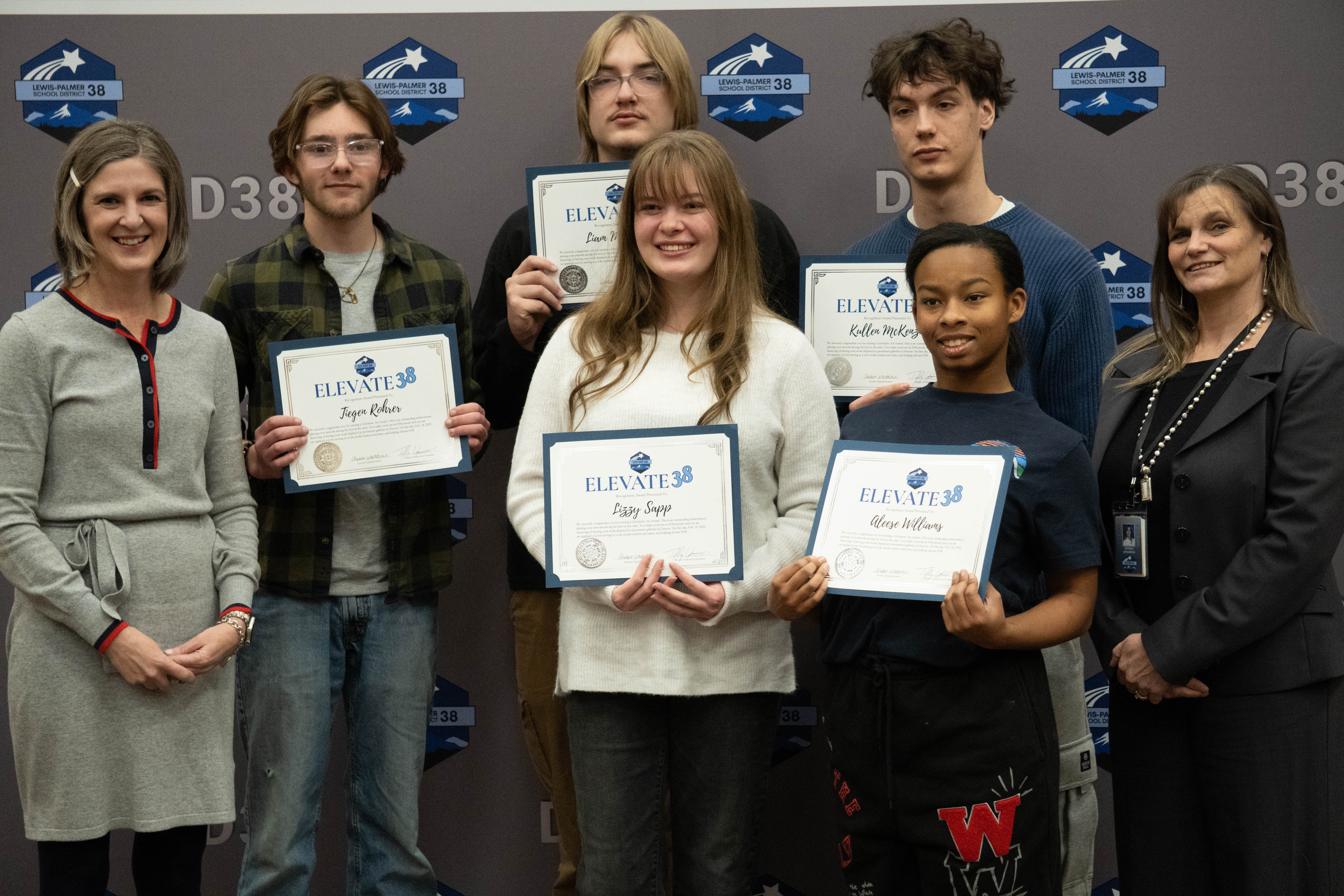 Student artists honored at Board meeting.