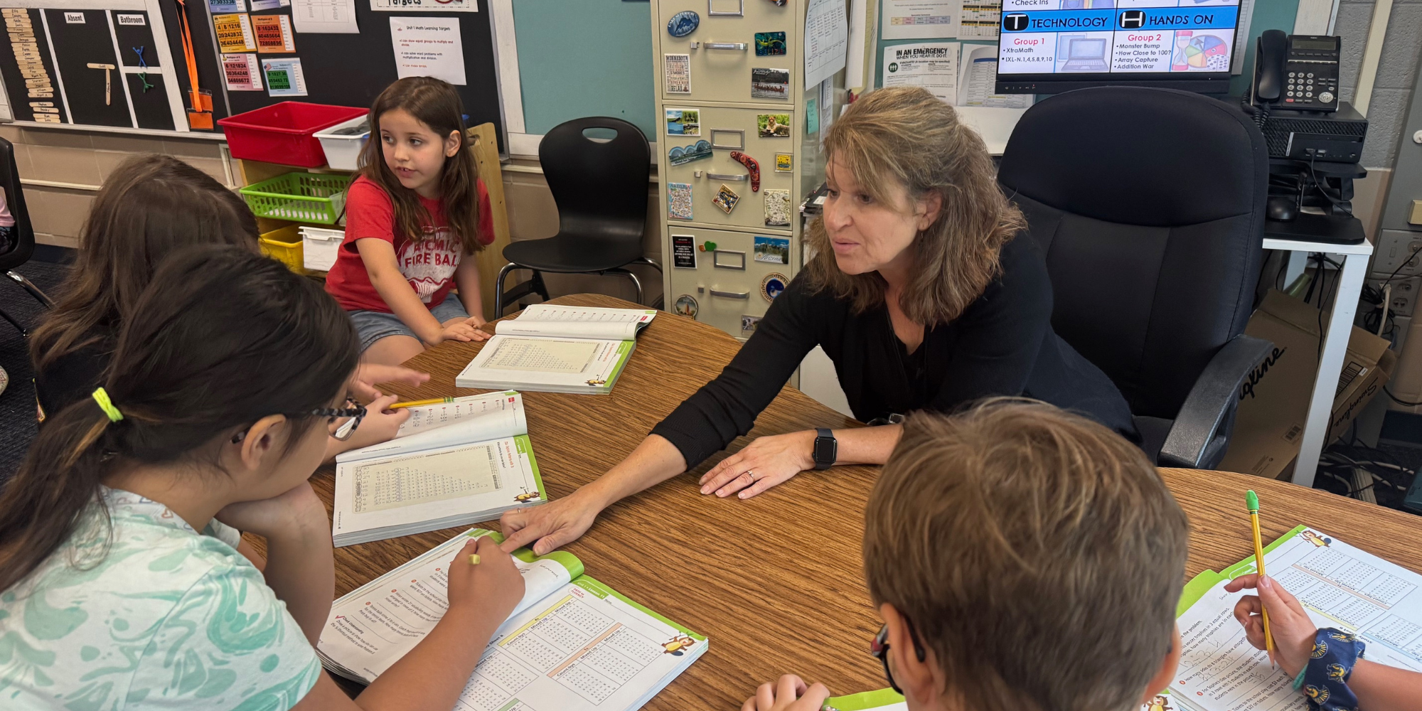 Teacher with students