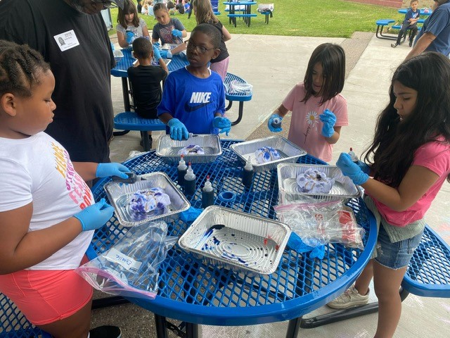 Mrs. Suppa's class tie dying.