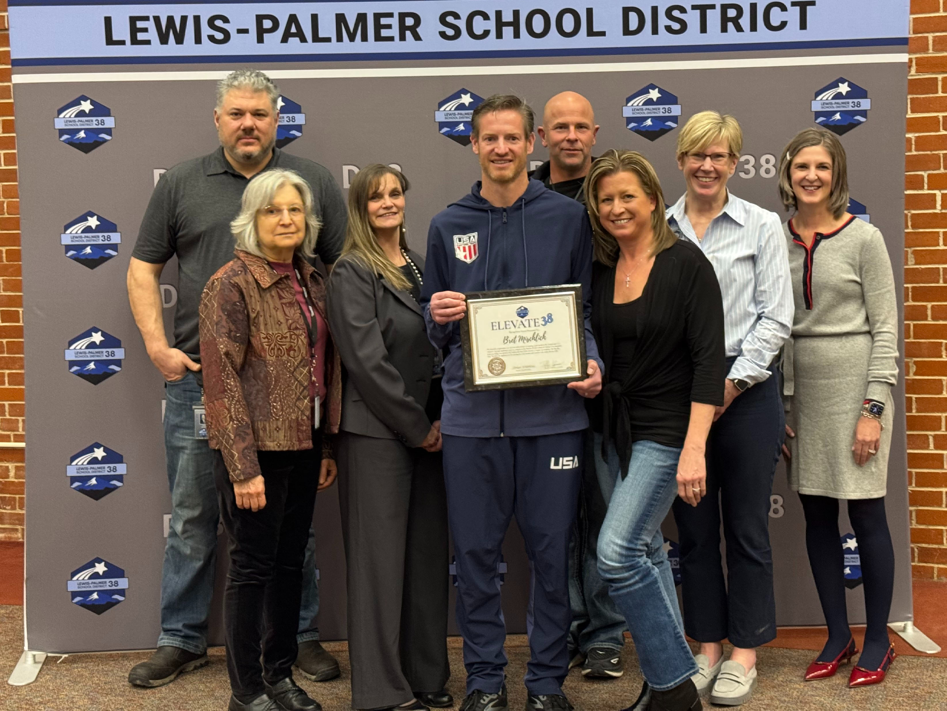 P.E. teacher from Palmer Lake Elementary receives an award.