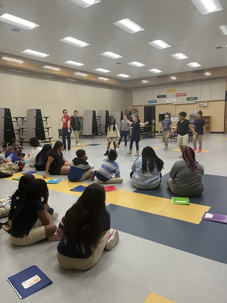Students rehearsing play