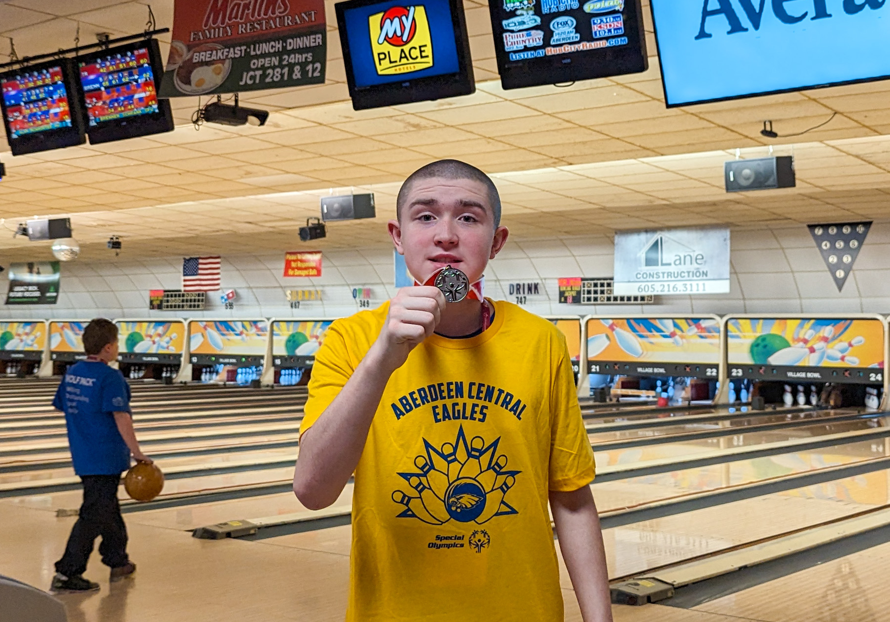 Golden Eagle bowler with medal