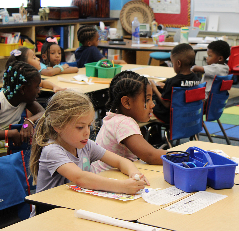 students drawing at their desks