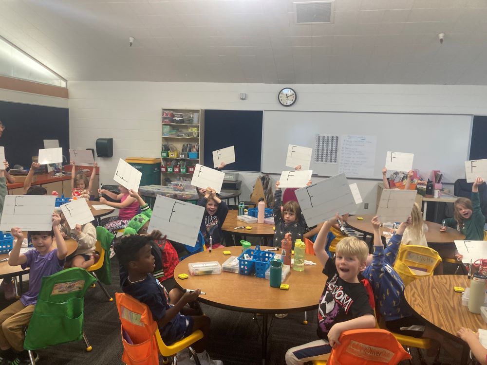 1st graders learning the letter F