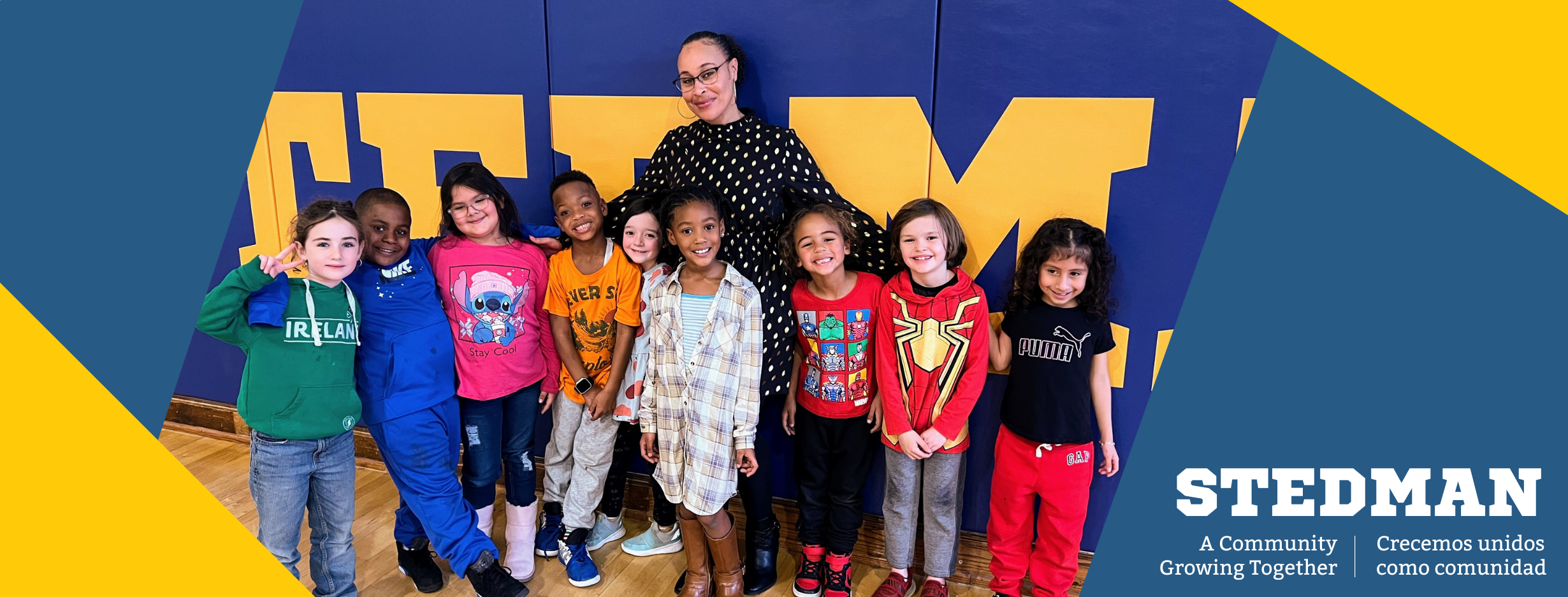 Principal Trotter standing with students