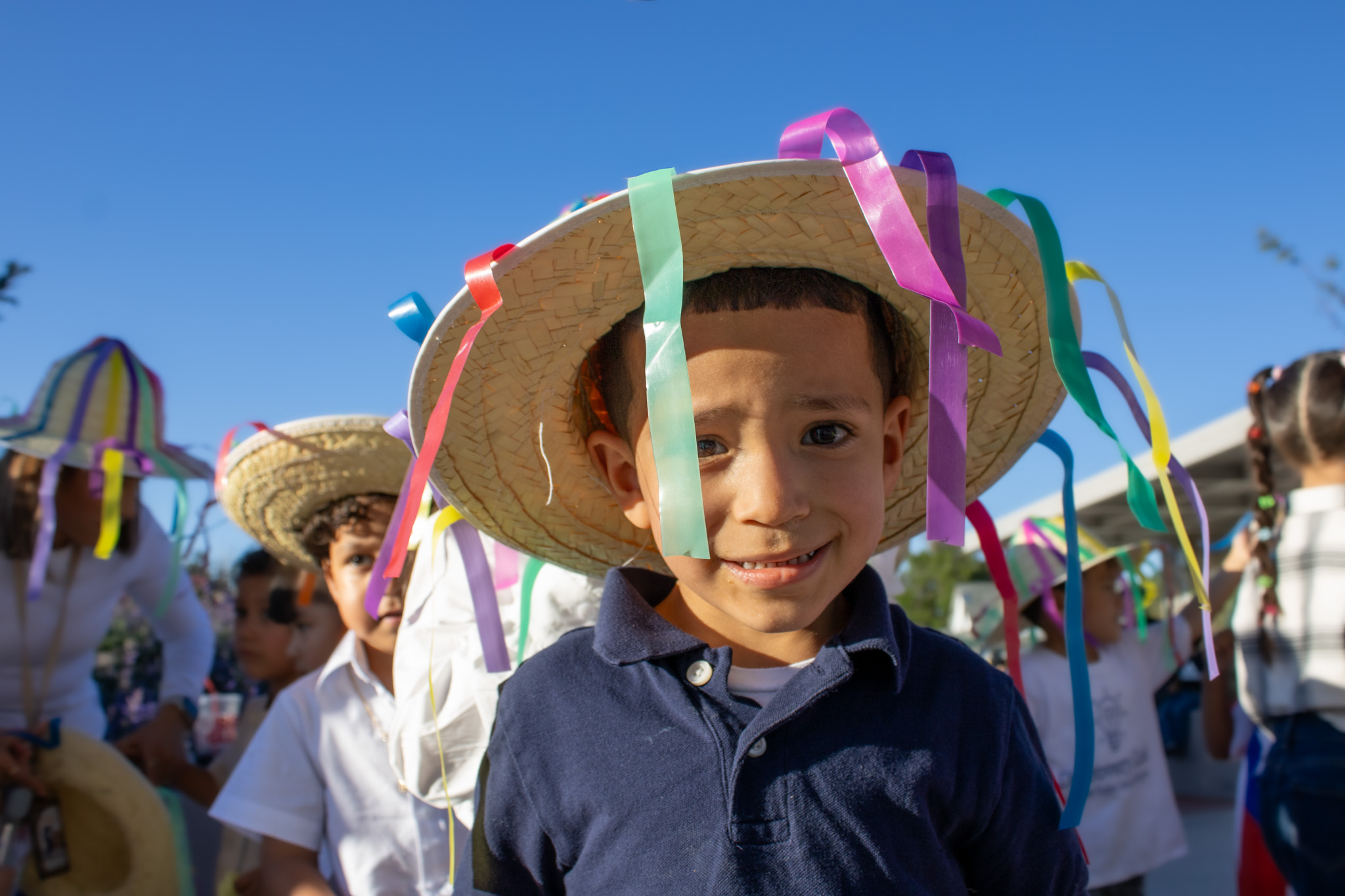 A student smiles before his performance at Fiesta Hispana.