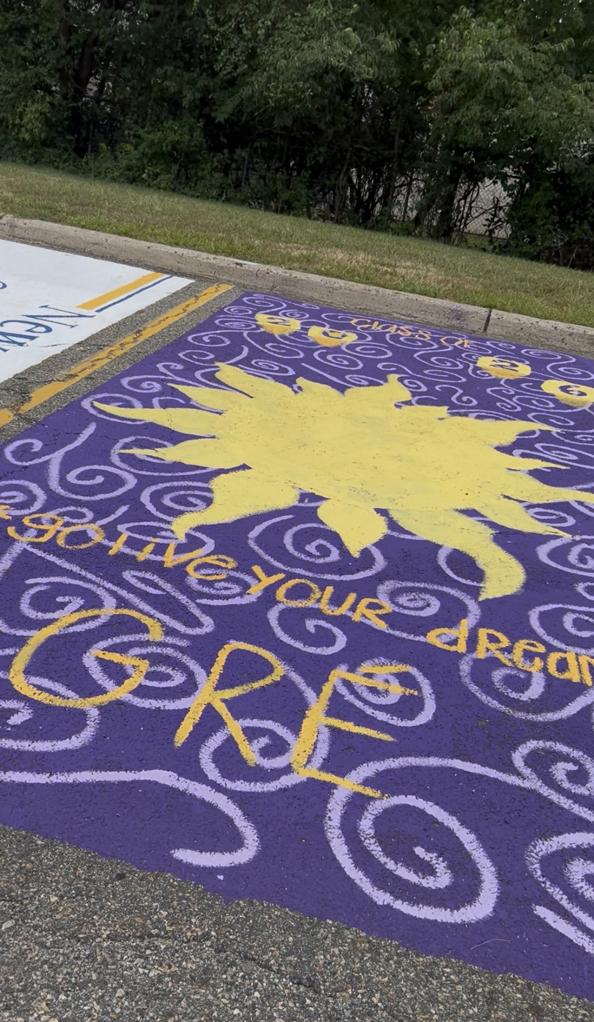 WHHS Paints a Parking Spot