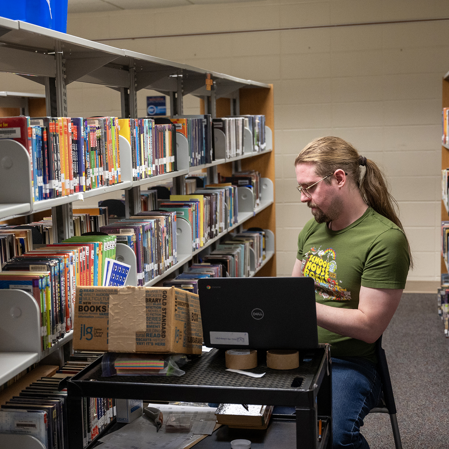 staff person working in the library