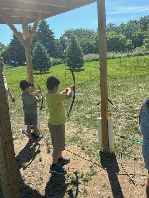 Students doing archery