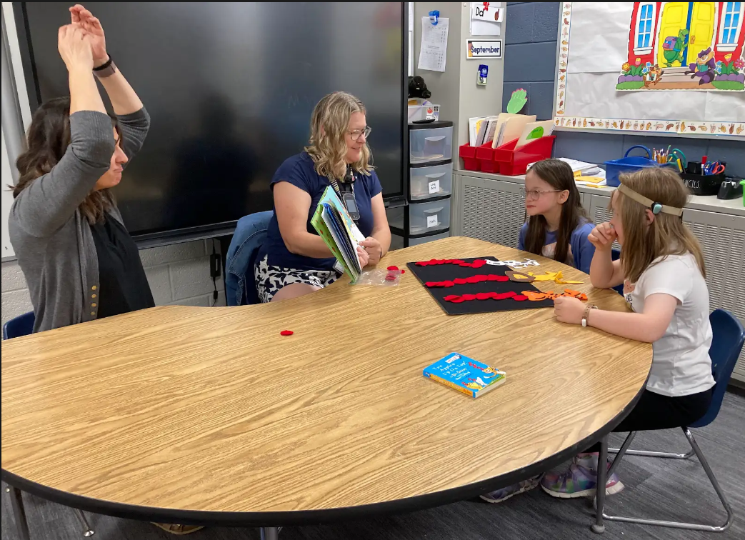 Ms Watkins's group reading 10 Apples Up on Top