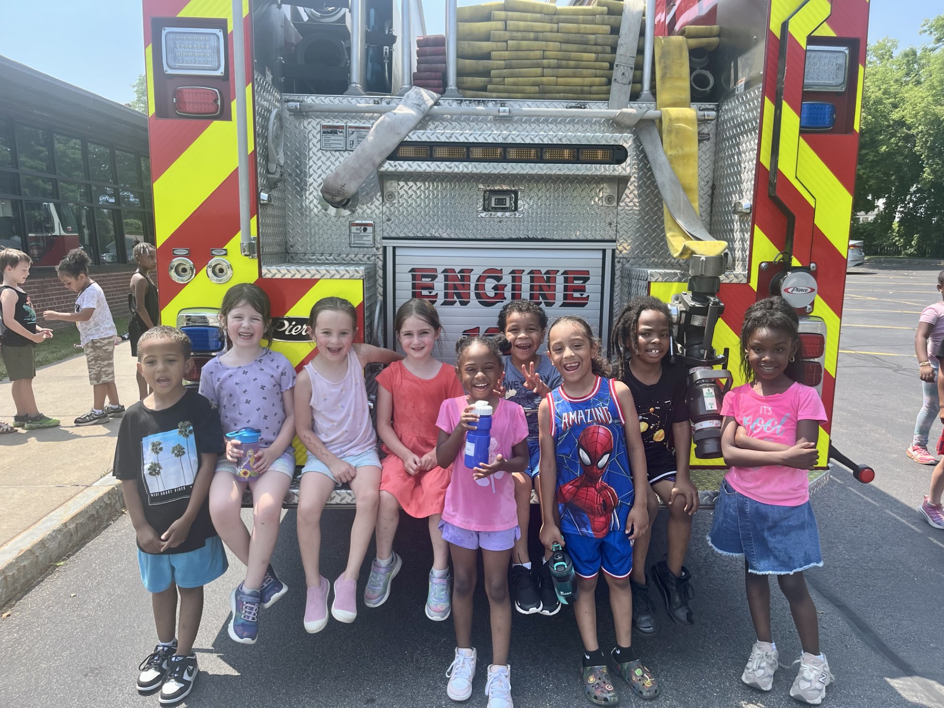 Class in front of firetruck