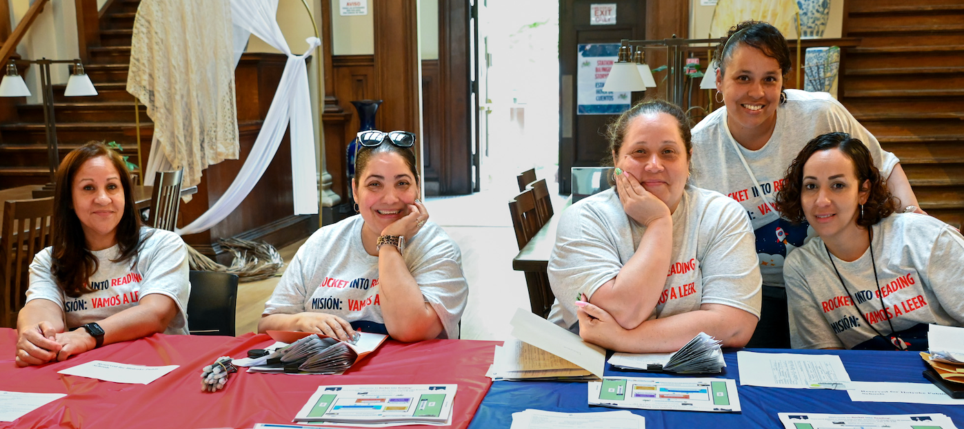 Members of the HPS FACE team smile at the camera during a family event