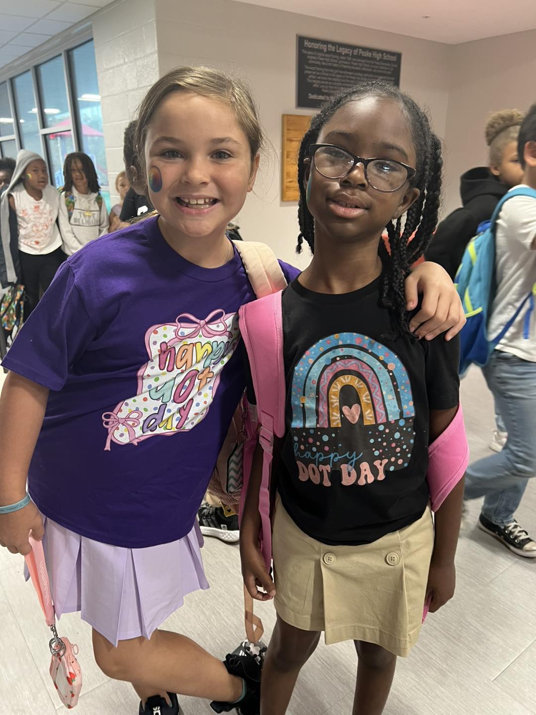 student holding the door open