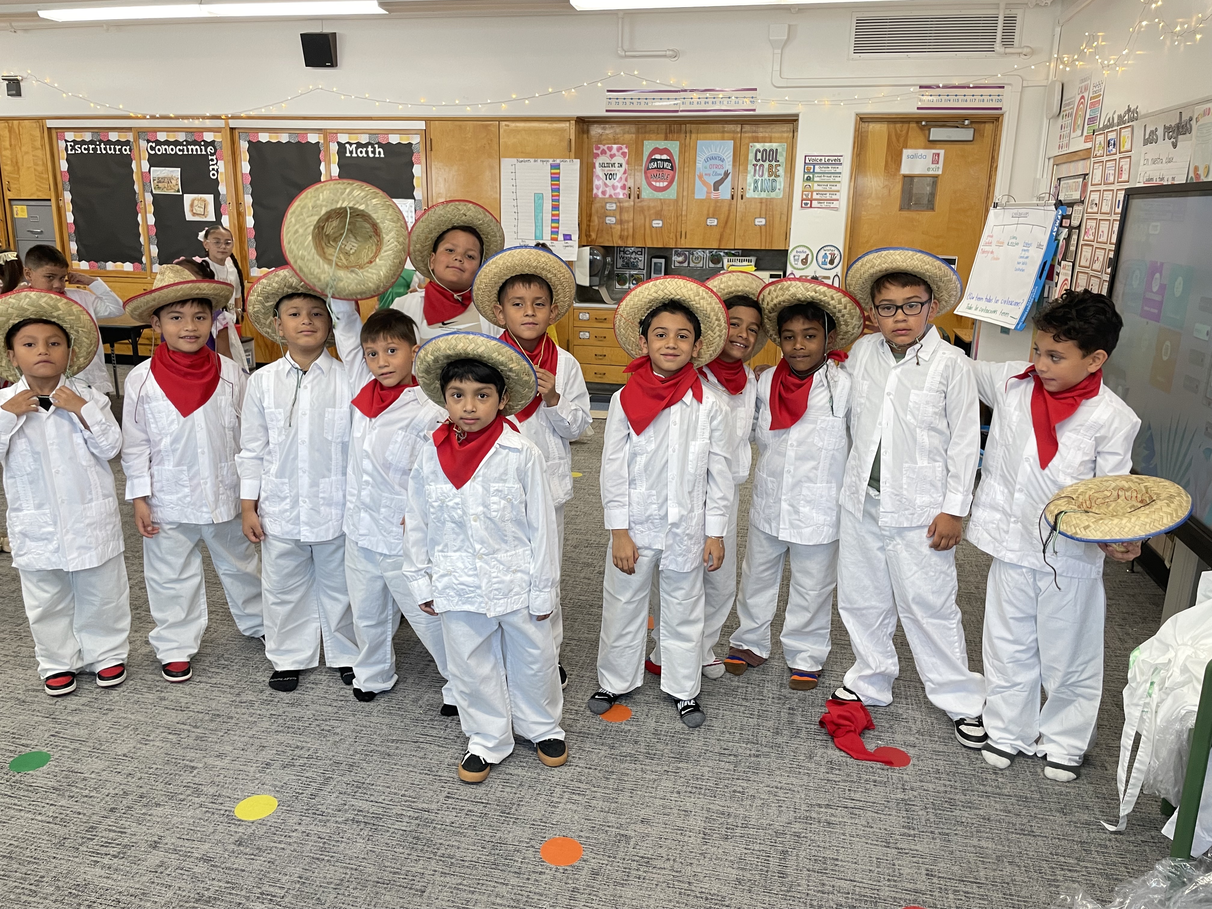 Students smile and pose for a photo as they celebrate Hispanic Heritage Month. 