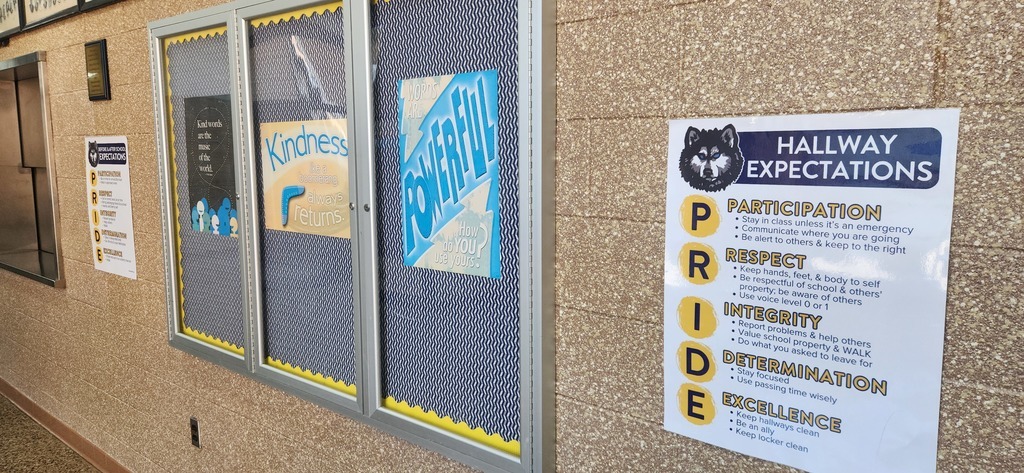 Huskie PRIDE expectations and positivity signs in the hallway