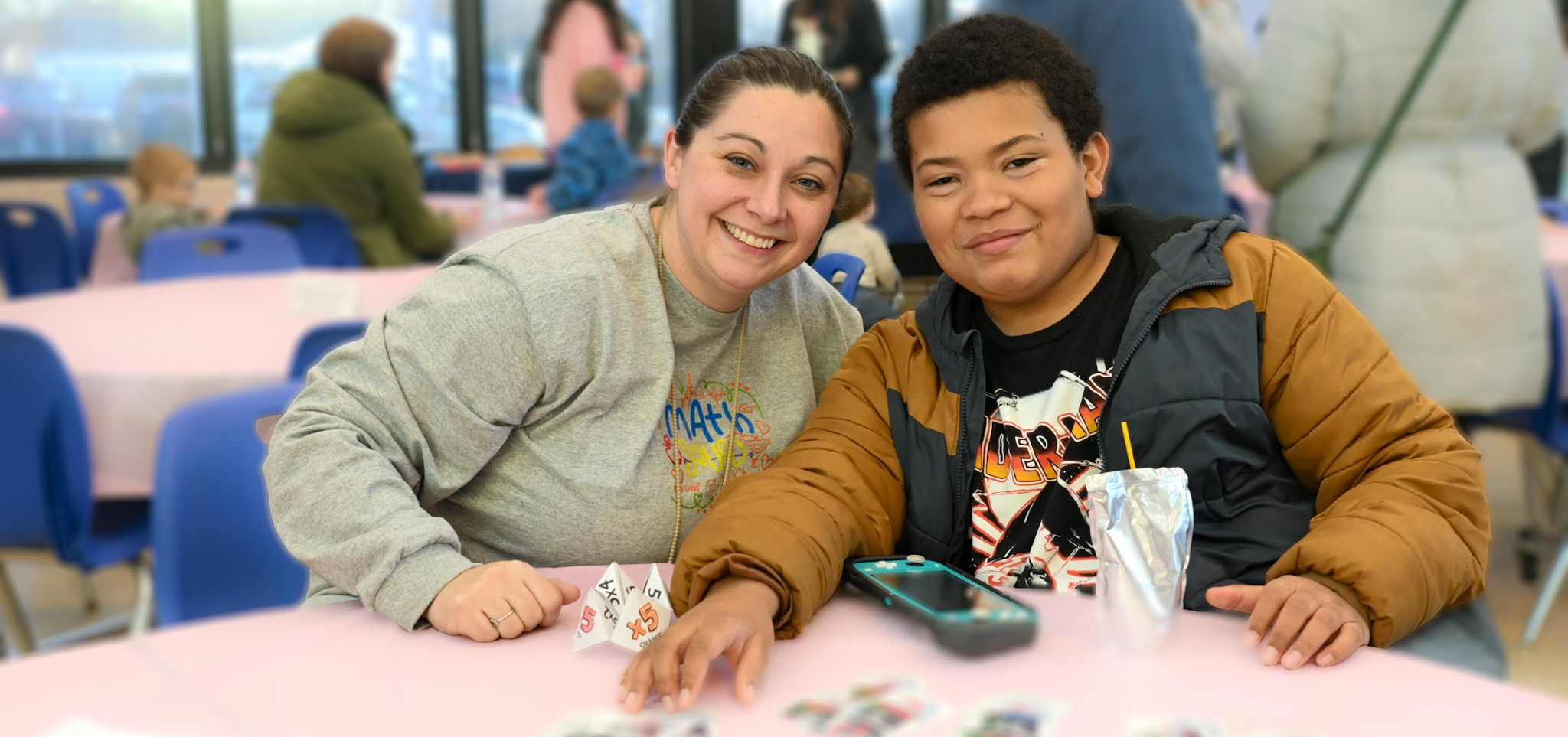 Student and teacher play a math game