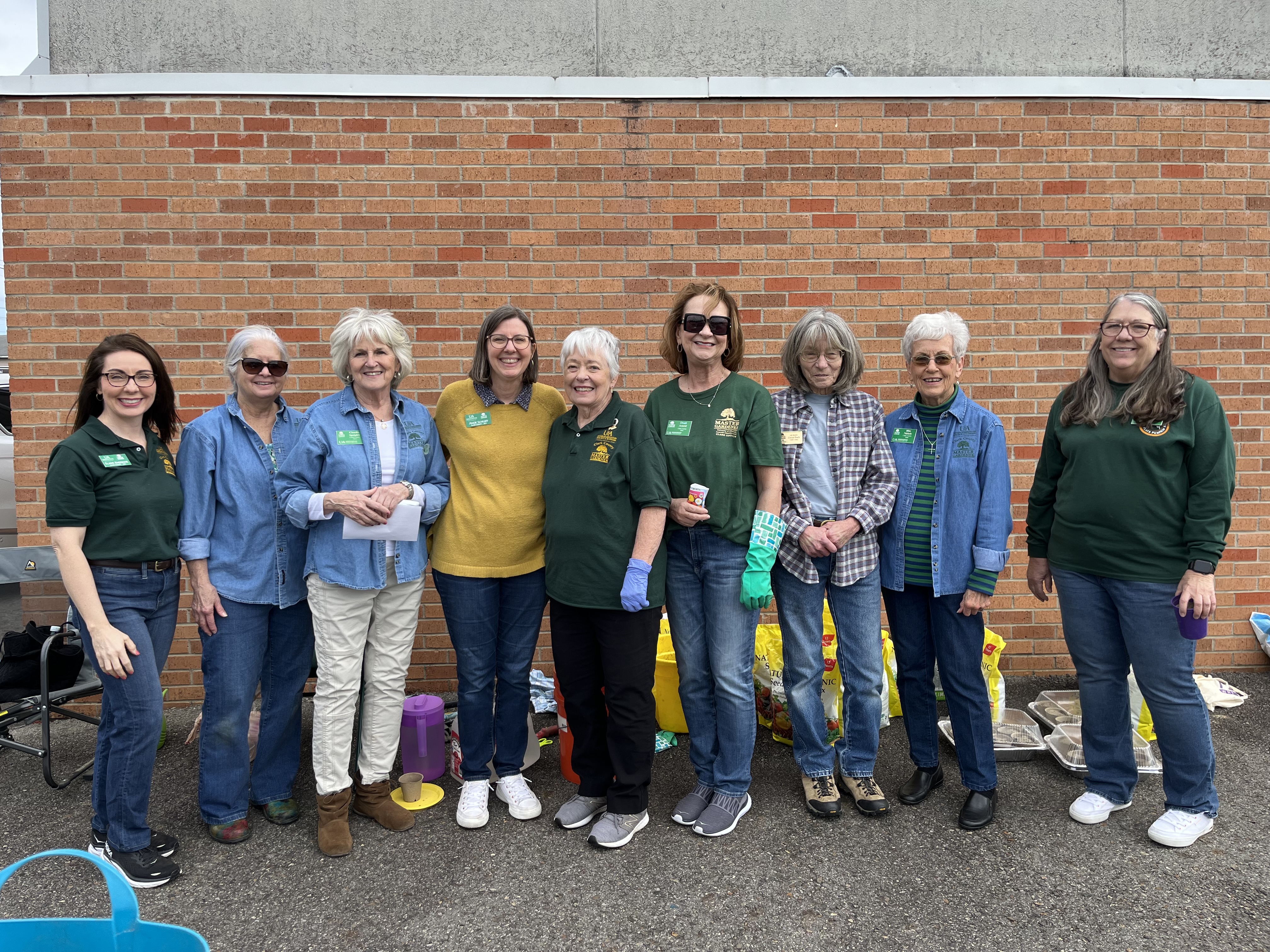 master gardeners smiling for the camera