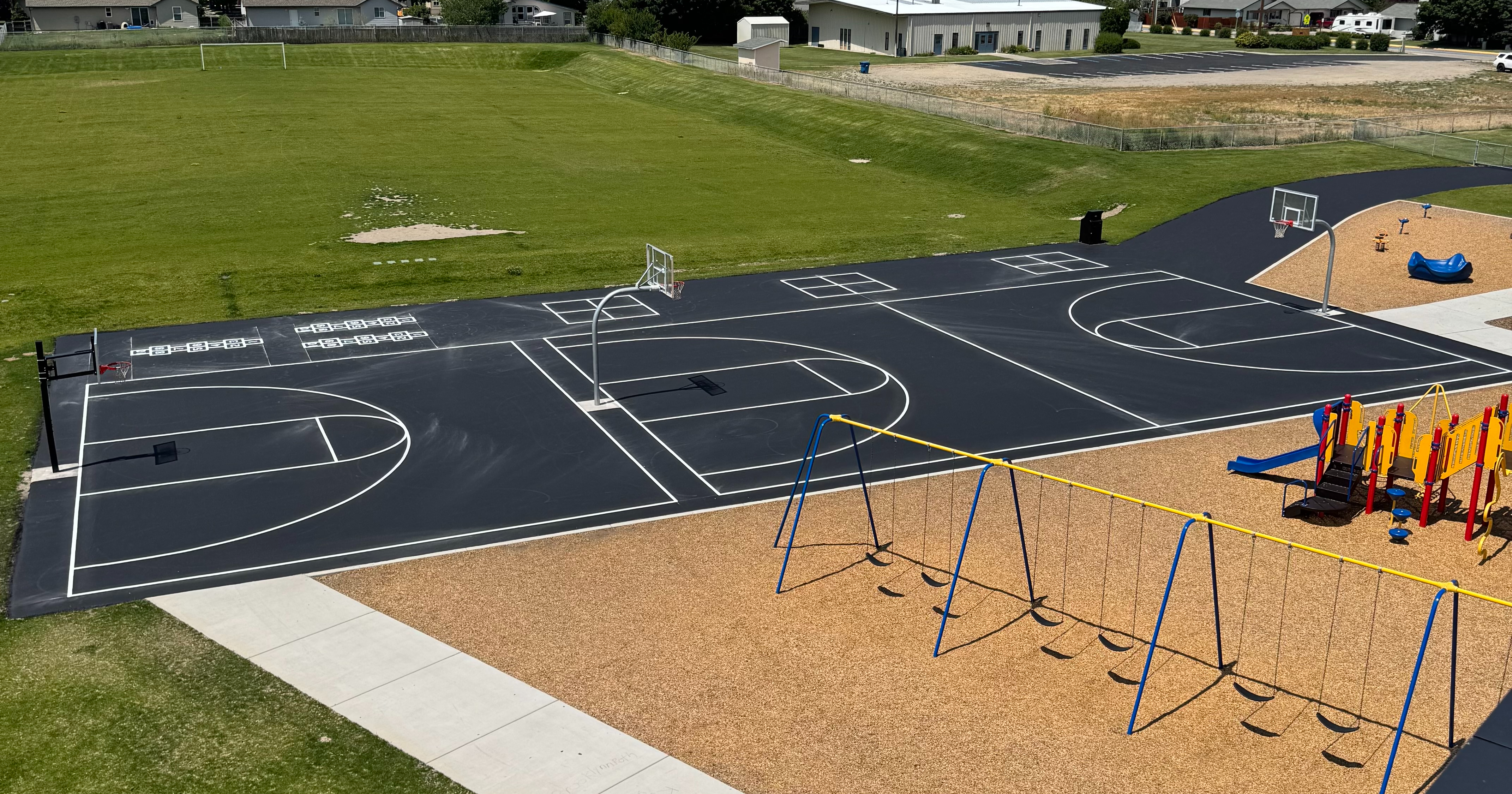 Refreshed blacktop with court lines