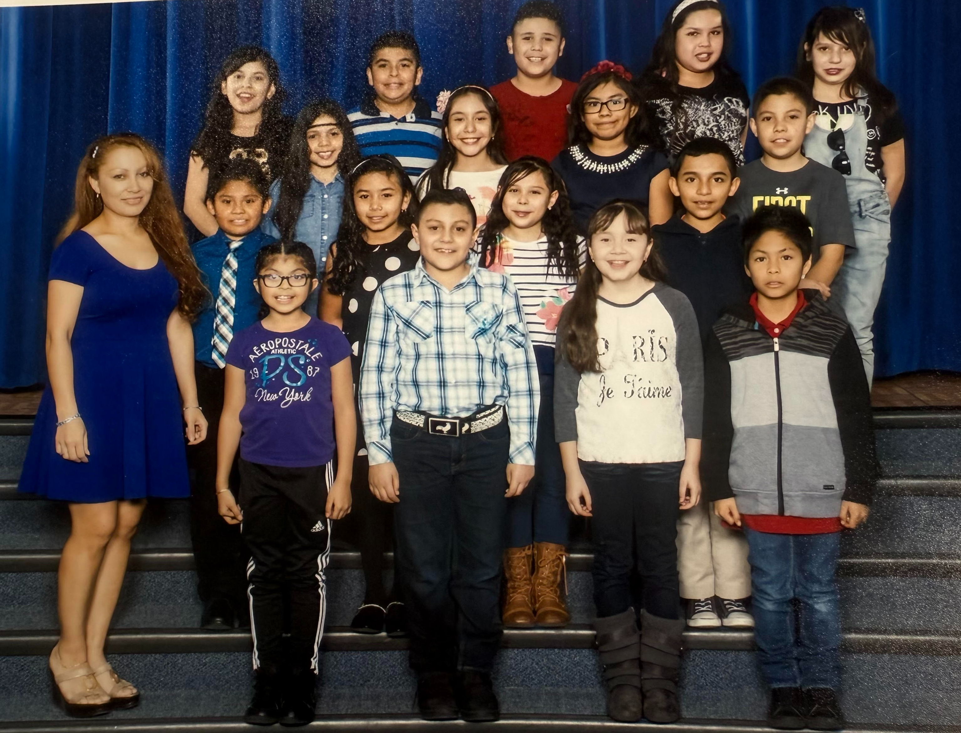 Pictured: Ms. Babb's class in 2015 picturing our mystery staff member as a student. 