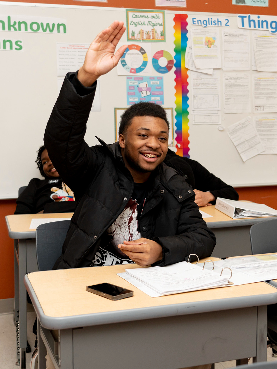 ACCE student raising hand