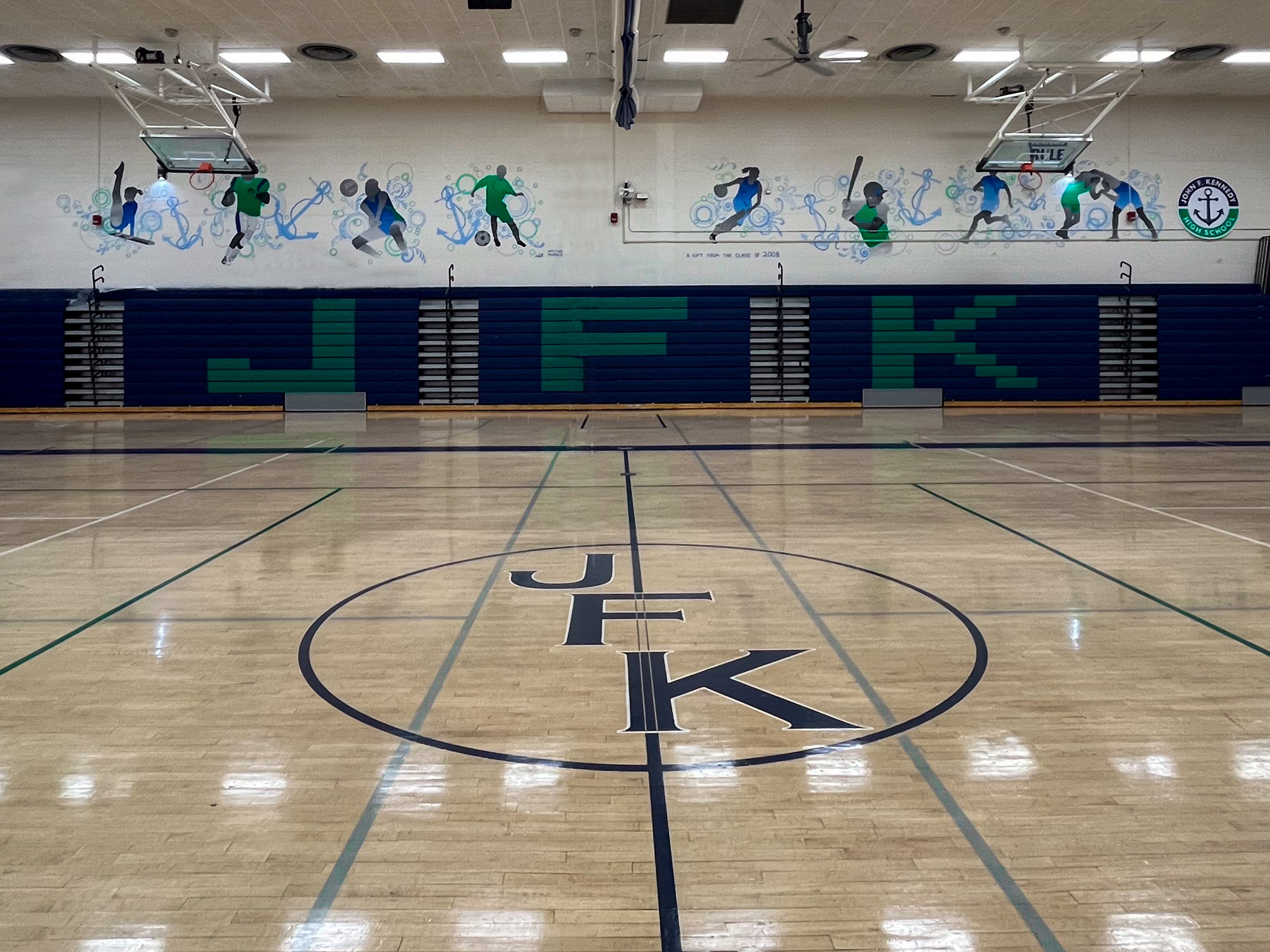 Pictured: The Kennedy gym with the murals donated by Class of 2008.